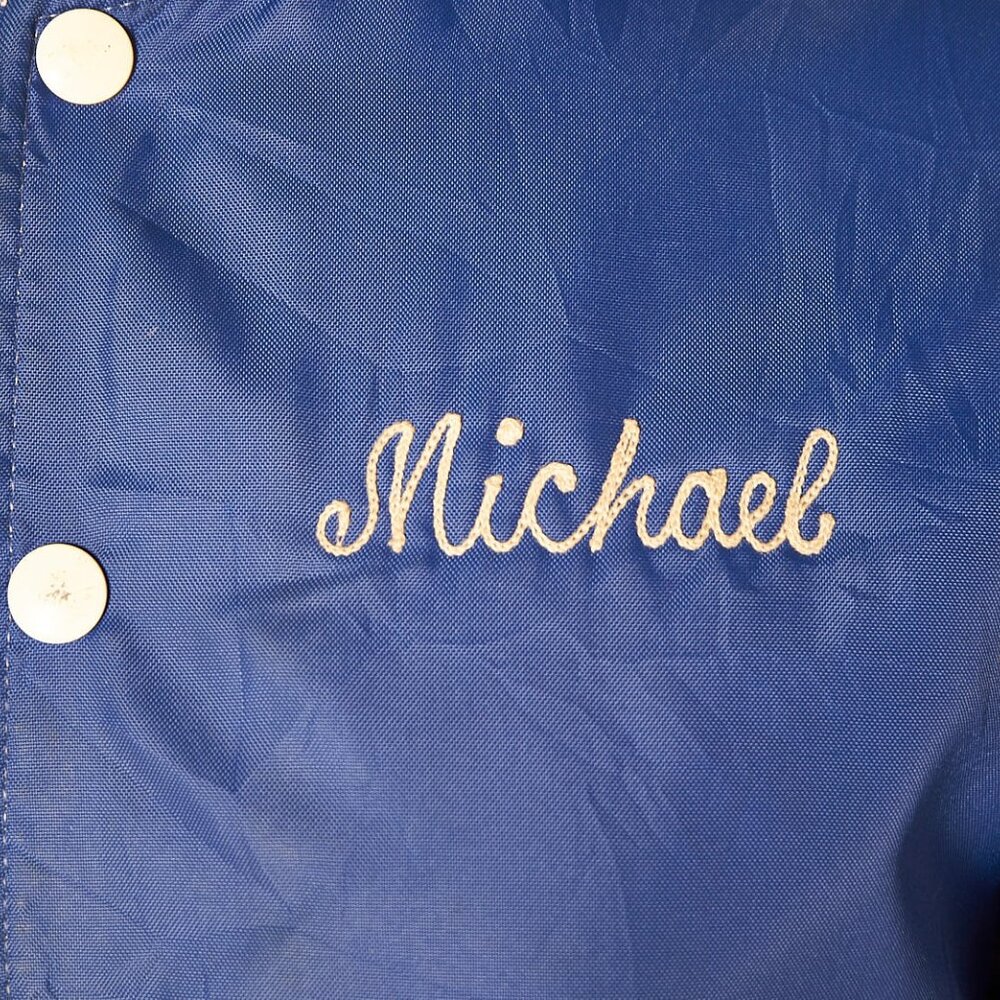 1980s Blue Nylon Patched Jacket Chain Stitched Michael